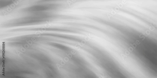 Soft flowing white silk fabric with smooth wave patterns creating a light and elegant abstract background