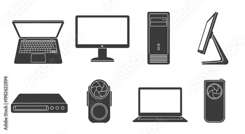 Assorted computer hardware and peripherals including laptop, monitors, desktop tower, printers, speakers, and networking devices.
