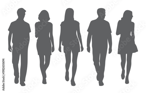 silhouettes of young adults walking together 