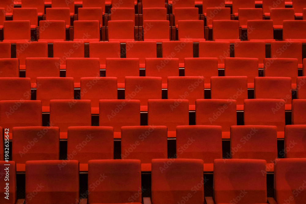 Obraz premium Red empty seats in the theater auditorium