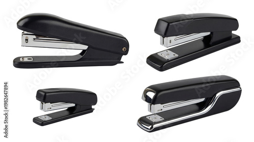 Cuadro en lienzo Four black office staplers in various positions and designs, isolated on a transparent background