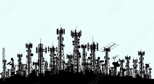 Communication towers silhouette with antennas and satellite dishes representing global telecommunication network and digital connectivity