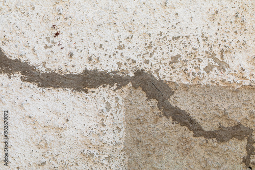 vintage industrial grunge background featuring distressed concrete and mud tracks