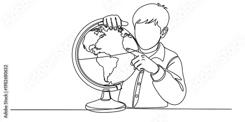 A black and white line drawing of a young boy pointing at a world globe on a desk for education