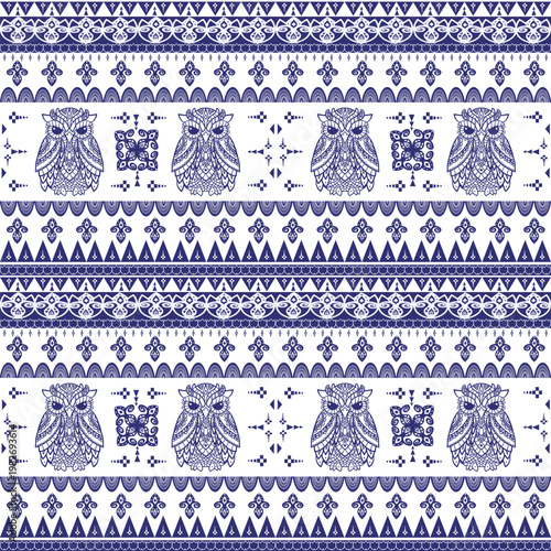 Seamless Tribal Owl Pattern with Ornamental Geometric Elements in Blue and White
