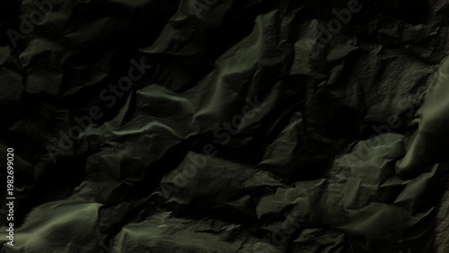 Rocky rugged mountainous terrain with crumpled earth surface in shades of green natural landscape