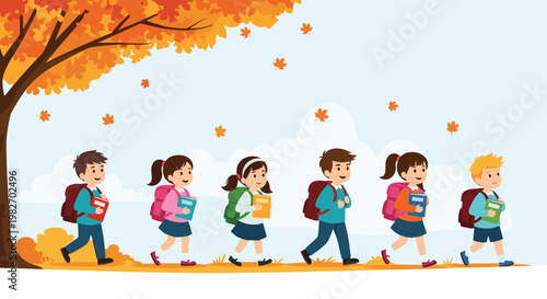 Group of diverse school children in uniforms carry books while walking in a line under a colorful autumn tree in a park.