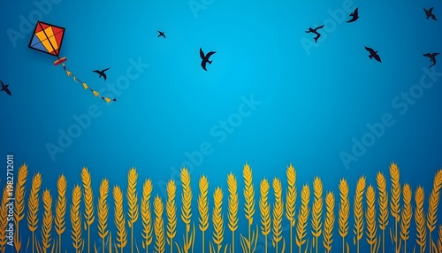 Colorful kite and birds flying in blue sky above golden wheat field harvest festival greeting card background metaphor