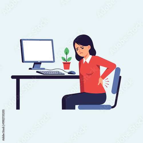 Woman suffering from back pain while working at a computer desk, office discomfort