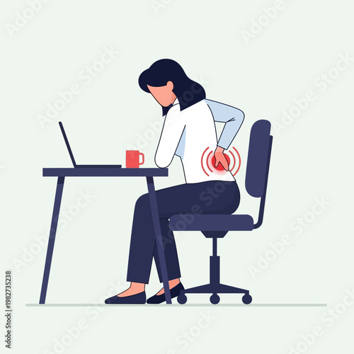 Woman suffering from back pain while working at a desk with a laptop