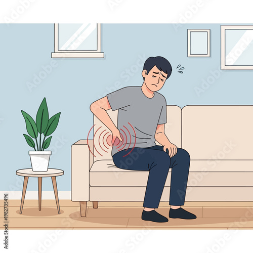 Man suffering from severe lower back pain, sitting on a sofa at home, feeling discomfort.