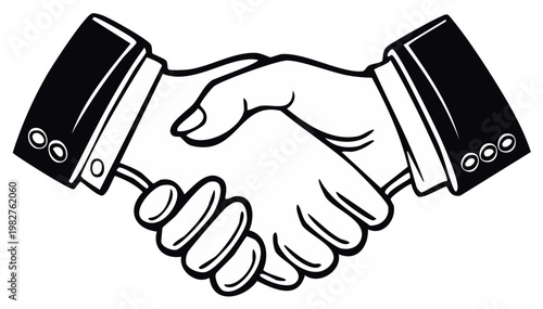 Two people shaking hands in business suits, symbolizing agreement and partnership