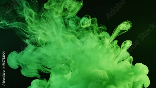 Green ink dispersing in liquid for commercial backgrounds, digital design, and advertising