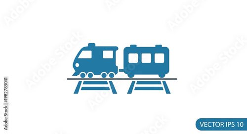 Blue train on rail tracks side.