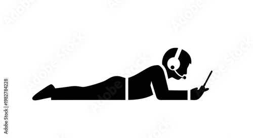 Operator with Headset Lying Down Using Tablet, Remote Work Concept