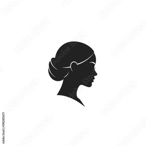 Woman's head silhouette in profile with elegant hair bun