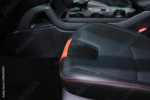 Black leather seats inside the car.