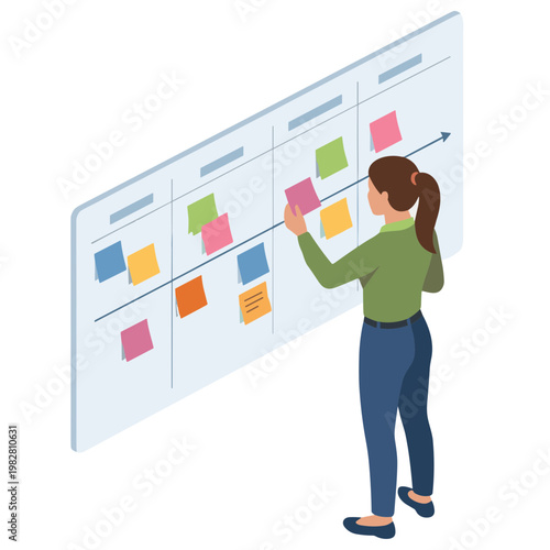 Woman planning tasks on a large Kanban board in an office