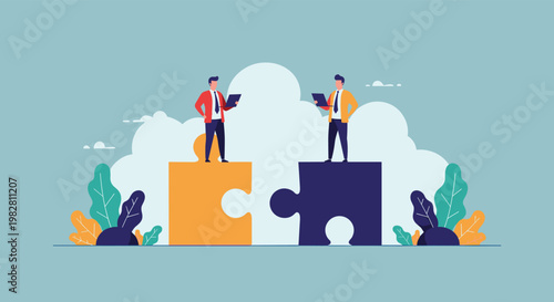 Collaborative business partners stand on separate puzzle pieces while working on their laptops against a bright cloudy sky backdrop.