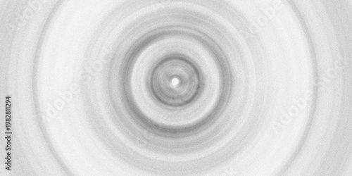 Abstract monochrome circular ripple pattern with grainy texture