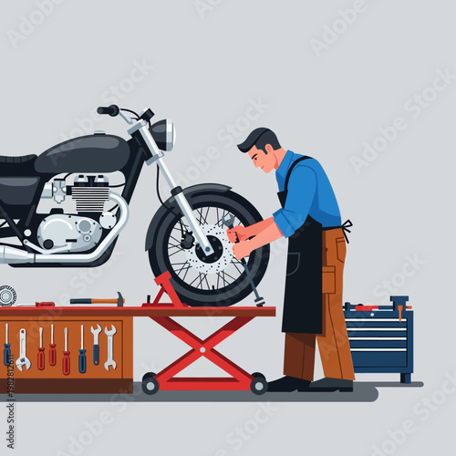 Motorcycle mechanic working on a bike wheel in a workshop, tools and toolbox nearby