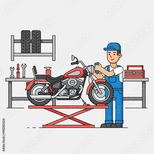 Motorcycle mechanic working on a red cruiser bike on a lift in a workshop