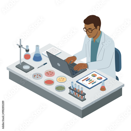 Scientist working on laptop at laboratory table with various science equipment and samples.