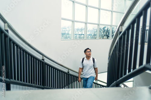 Man Walking Up Spiral Stairs Indoor Modern Architecture