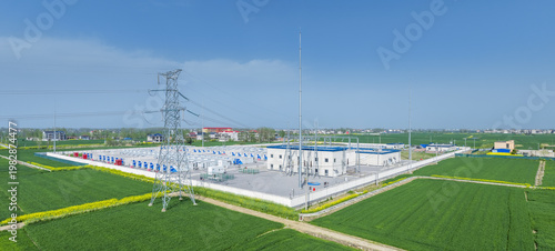 Wallpaper Mural Aerial View of a Modern Battery Energy Storage Power Station and Rural Spring Wheat Landscape Torontodigital.ca