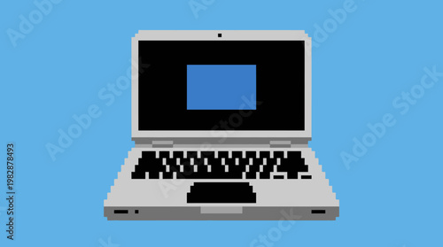 A silver laptop on blue background.