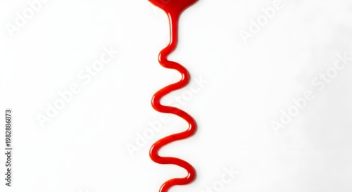 Red liquid abstract shape against a white background graphic design