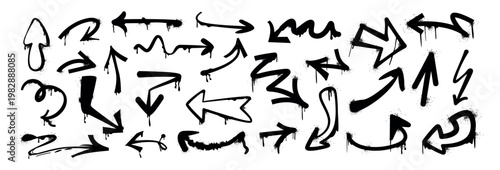 Hand drawn brush stroke arrows different shapes. Black bold curly, wavy or squiggly arrow vector set. Spray paint graffiti direction graphic design elements with drips, splatters in retro grunge style