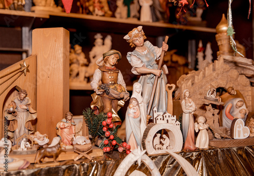 Photography Traditional nativity scene with figurines in christmas market display