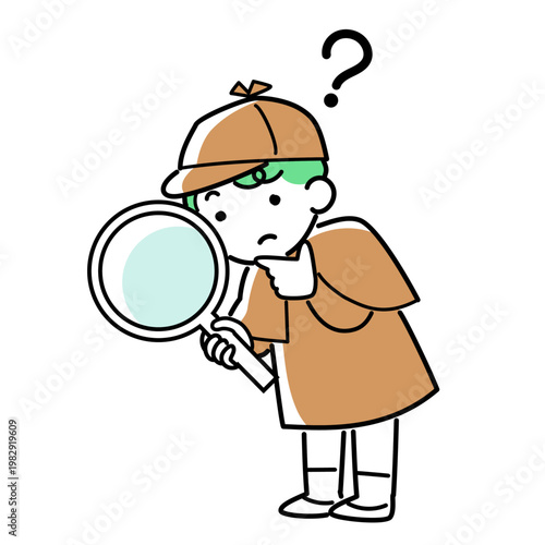 虫眼鏡を持って調べる探偵の男の子
