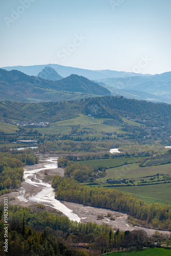 Italy, 10 April 2026: Panoramic view of Val Marecchia with Marecchia River and medieval hilltop villages, Emilia Romagna Rimini landscape, scenic countryside valley view