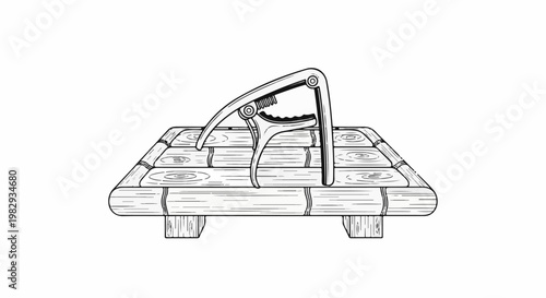 A close-up, black and white sketch of a guitar capo resting on a wooden platform