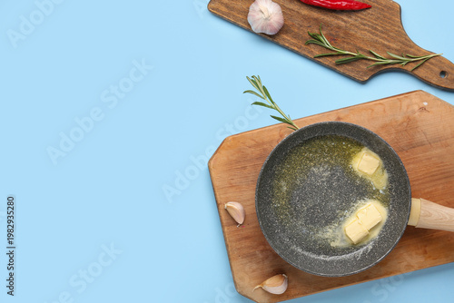 Frying pan with butter on b...