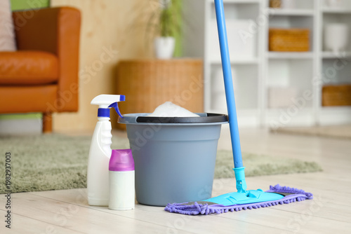 Mop with bucket of water, d...