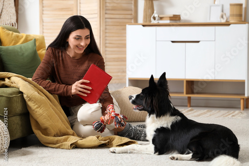 Young woman with book and t...
