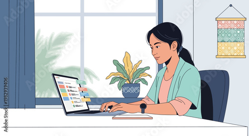 Young woman working on laptop at home office desk with plant and window view