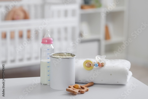 Bottle with baby milk formu...