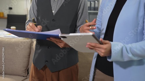 Asian businessman discuss with new startup project Idea presentation, analyze planning and financial statistics and investment market at office.