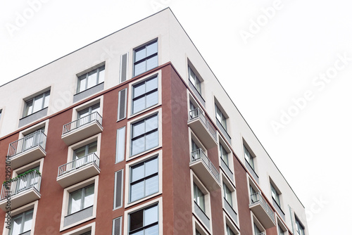 Fotografie Modern apartment building with red brick and white accents