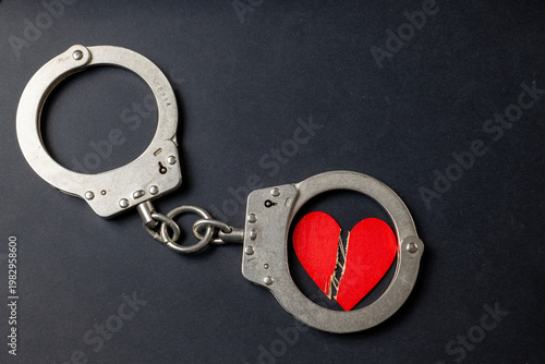 Broken Heart In Handcuffs Concept