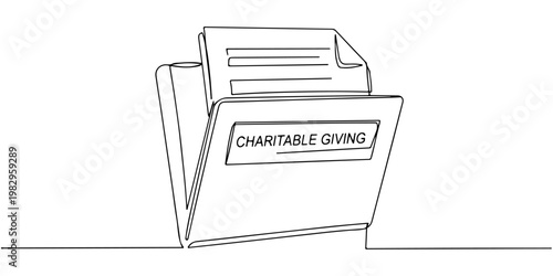 Folder labeled charitable giving containing papers and documents.