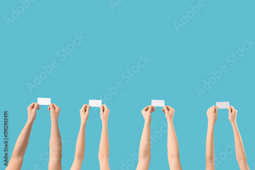 Many hands with blank paper...