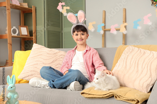 Cute little boy in bunny ea...