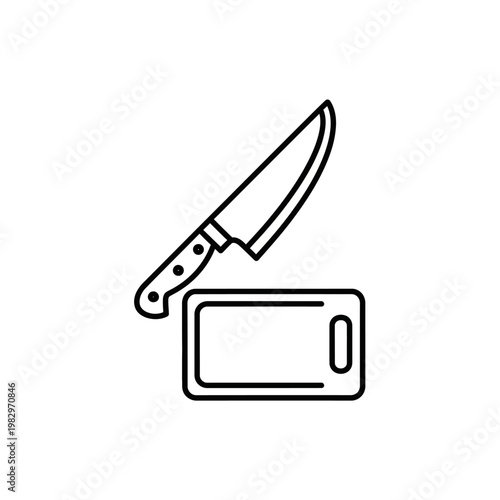 A knife on a cutting board.