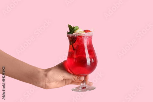 Female hand with glass of t...