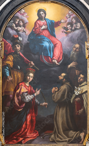BERGAMO, ITALY - MARCH 21, 2026: The painting of Immaculate Conception among the saints in the church Chiesa di San Pancrazio  by Cristofano Allori (1577 – 1621)